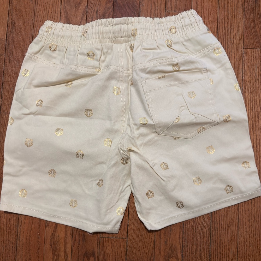 Cream Shorts with Gold Accents